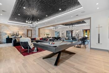 Billiard table in game room